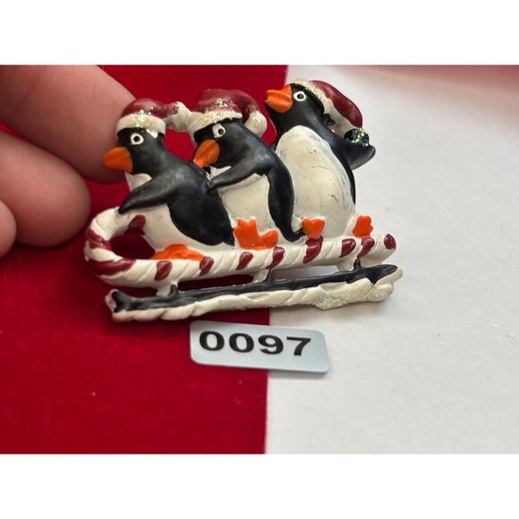 Penguin Sledding Brooch Pin Christmas-Themed Festive Jewelry With Glitter Accent - Picture 2 of 3